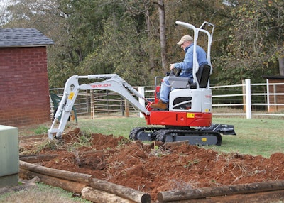 Takeuchi TB210R compact excavator digging