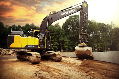 Volvo machine digging in dirt