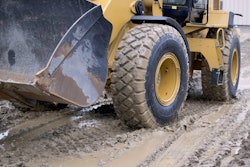 heavy duty machinery tracking through the mud