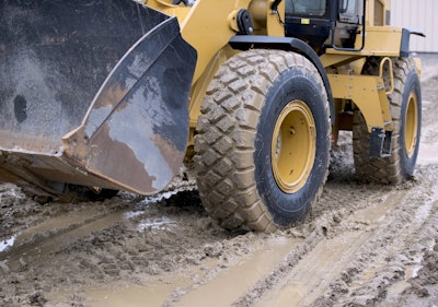 heavy duty machinery tracking through the mud