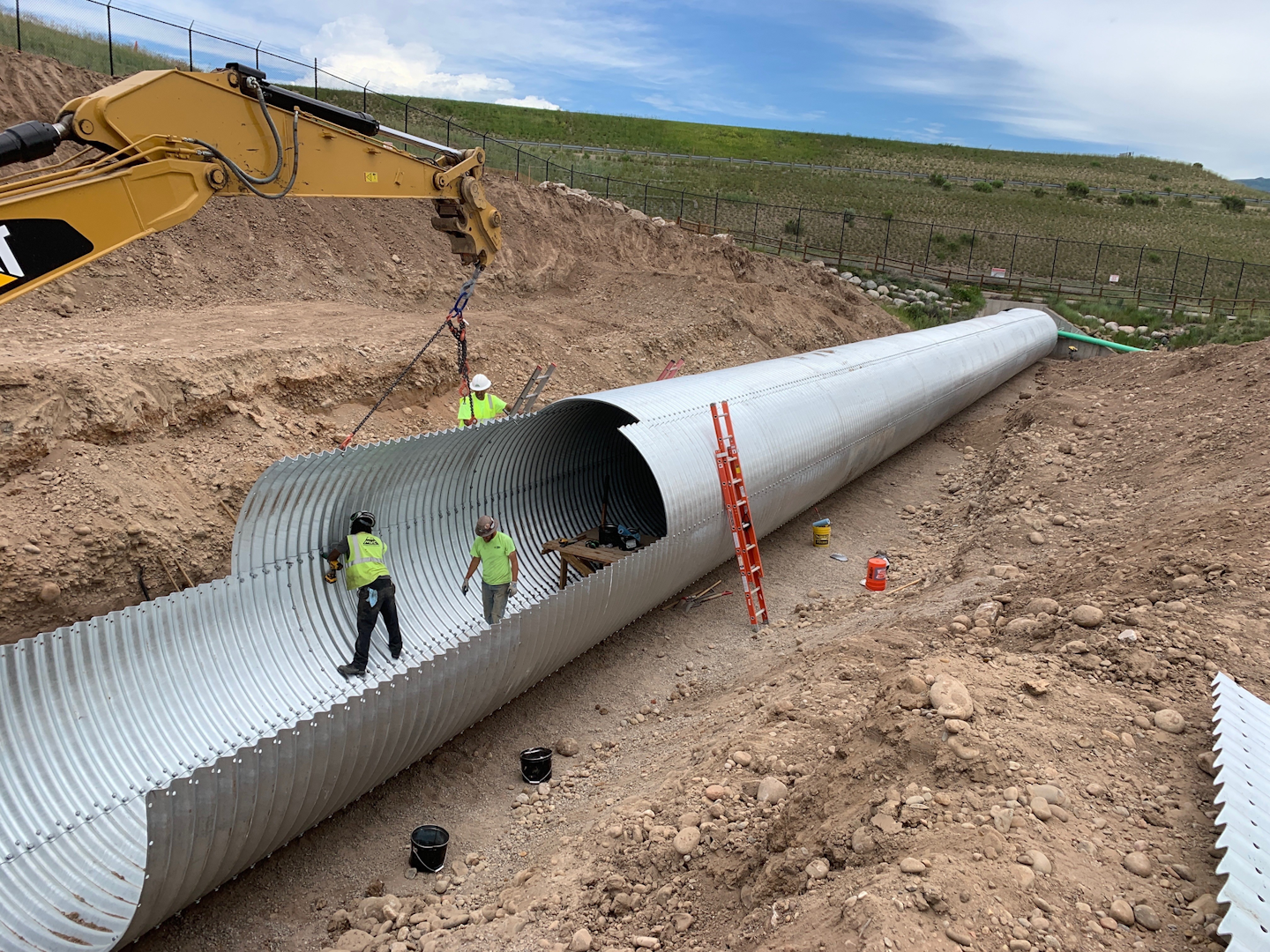 Mountain Valley crews install a 114-inch diameter plate arch culvert at the Eagle Airport in Eagle, Colorado.