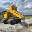 Terramac crawler carrier dumping rock