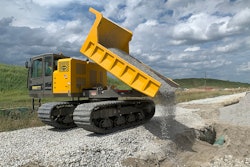 Terramac crawler carrier dumping rock