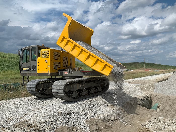 Terramac crawler carrier dumping rock