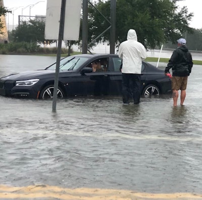Hurricane Ida flooded road Mississippi