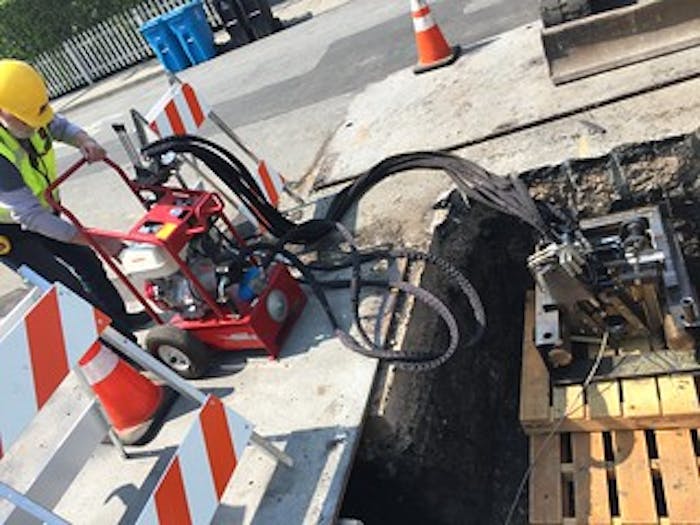 SLX1300's on-board pipe shear in use