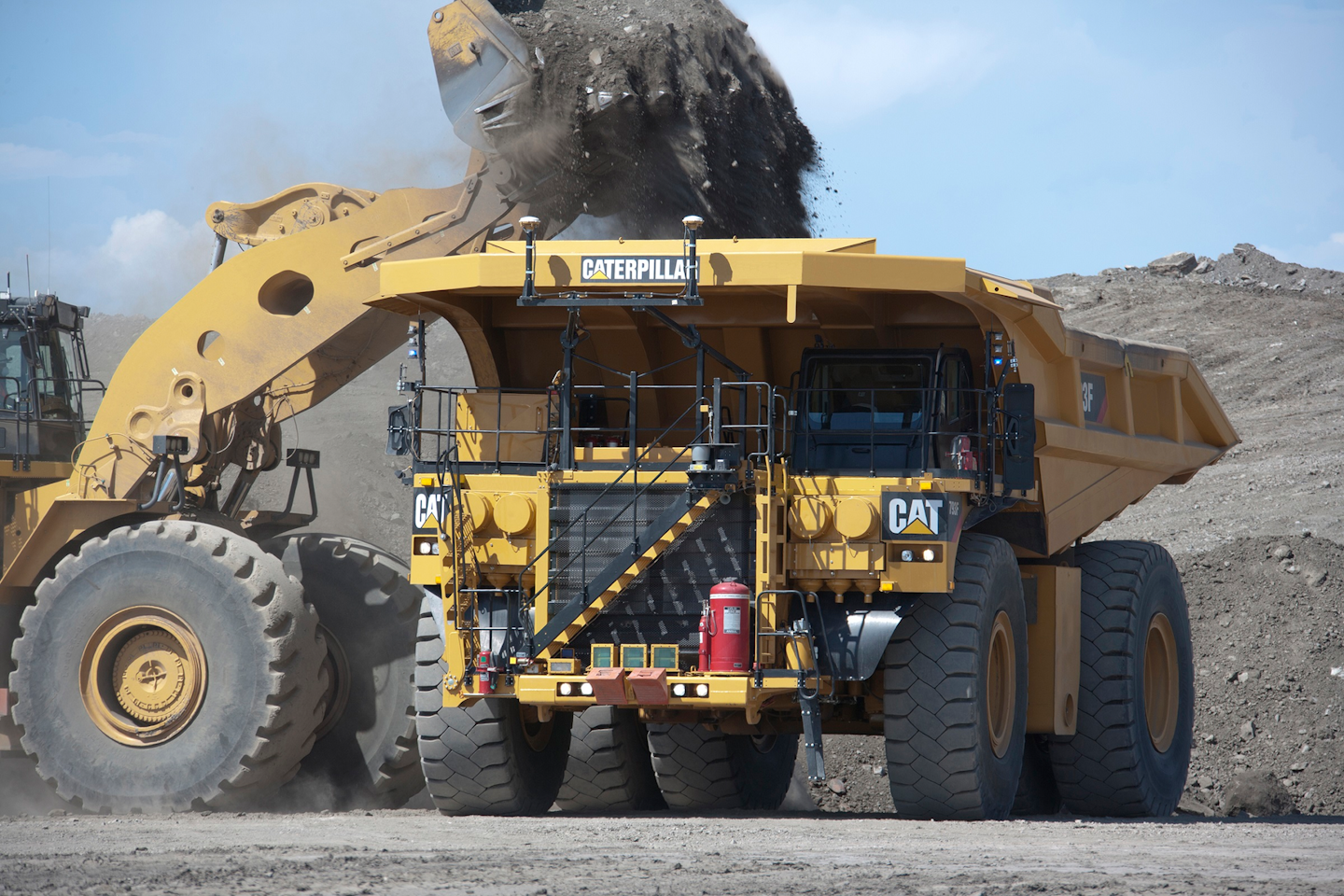 Caterpillar large mining truck being loaded