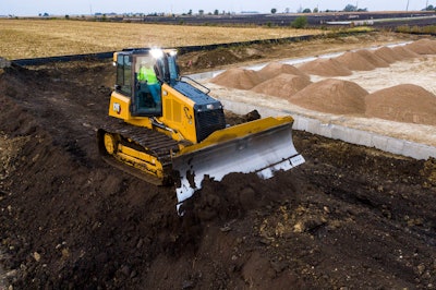 Cat D4 dozer dirt pile