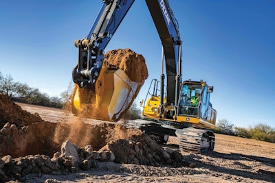 John Deere 350G LC SmartGrade Excavator scooping up a bucket of dirt