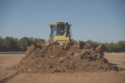 Komatsu D71PXi-24 dozer dirt pile