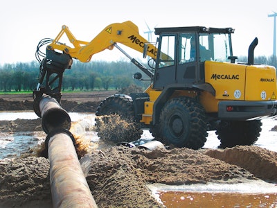 Mecalac AS210e wheel loader laying pipe