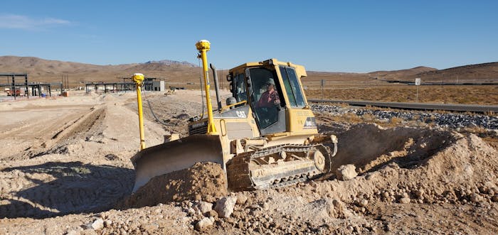 Union operating engineer uses a dozer with Trimble Earthworks.