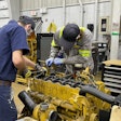 ThinkBig students training on cat engine