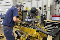 ThinkBig students training on cat engine