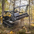 ASV RT-135F mulching a tree.
