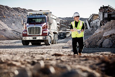 International HX620 dump truck on construction site