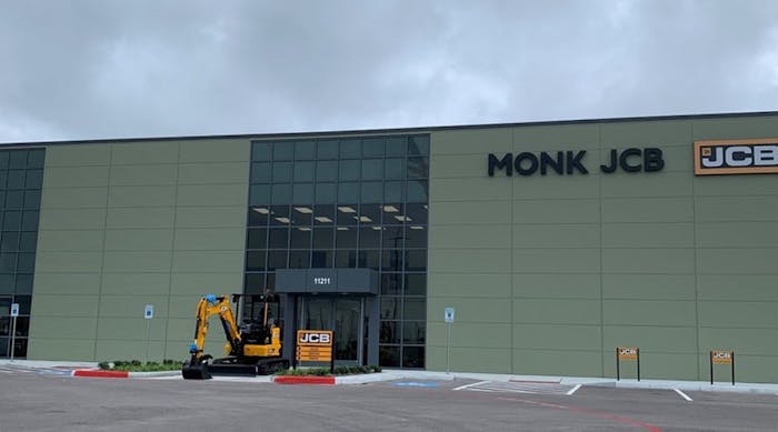 Monk JCB facility in Houston, Texas with mini excavator parked outside.