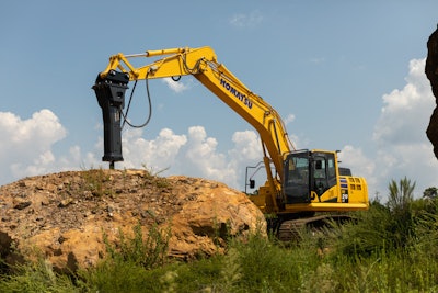 Komatsu JMHB-V breaker series excavator breaking rock