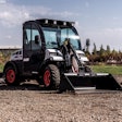 Bobcat UW53 Toolcat utility vehicle at a construction site.