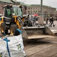 Volvo L25 wheel loader working in the central square in Gothenburg, Sweden.
