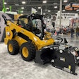Cat D3 Series Compact Track Loader with cold planer attachment at World of Concrete.