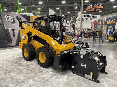 Cat D3 Series Compact Track Loader with cold planer attachment at World of Concrete.