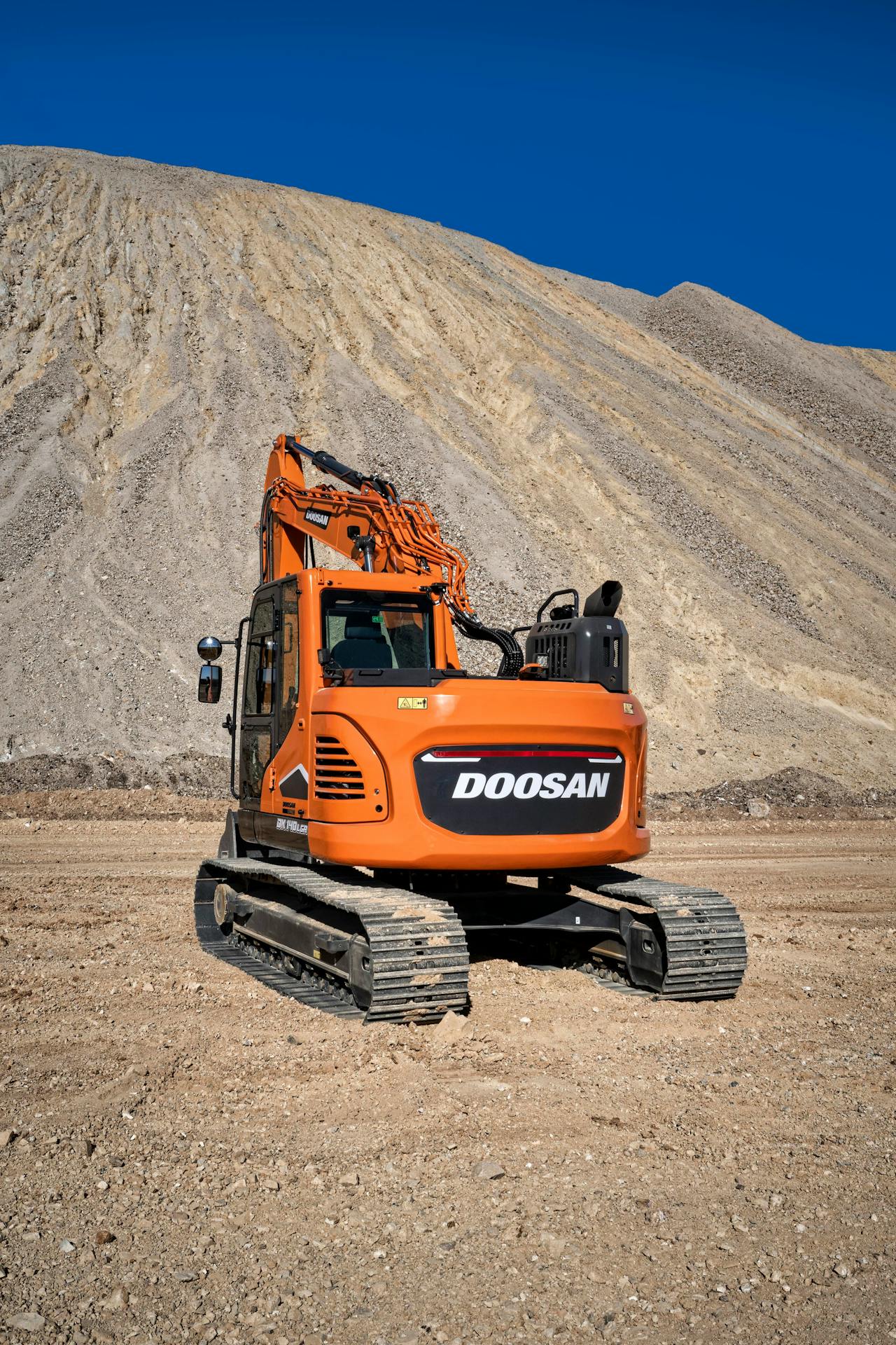 Doosan DX140LCR-7 excavator reduced tail swing view