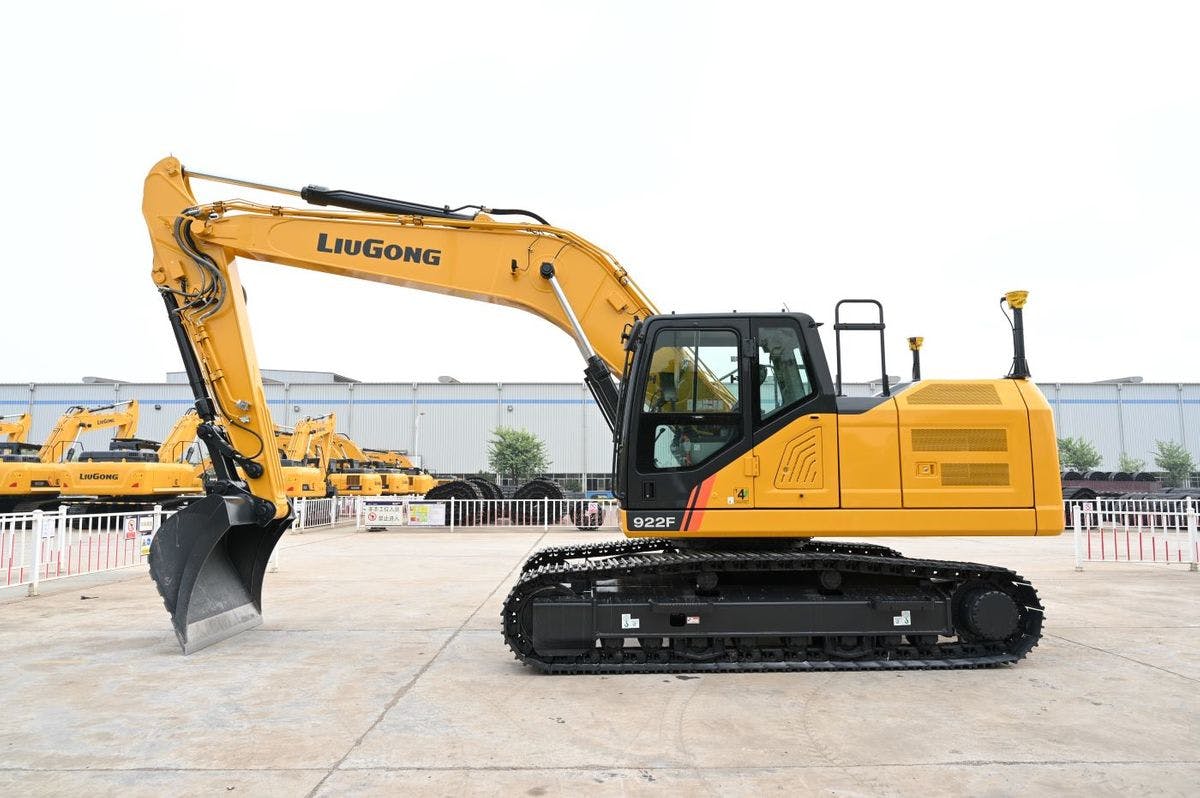 LiuGong 922F excavator parked outside a manufacturing facility.