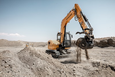 LiuGong's 909ECR excavator digging at a construction site