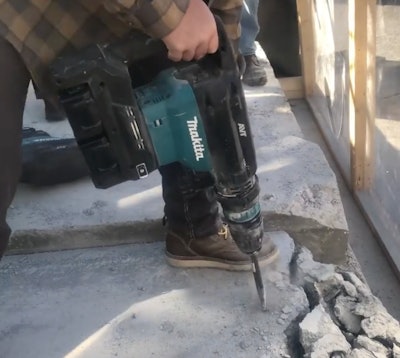 Battery powered demolition hammer top