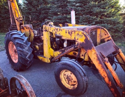 1958 John Deere Model 440 backhoe loader outside