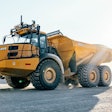 Bell Trucks articulated dump truck outfit with artificial intelligence technology.
