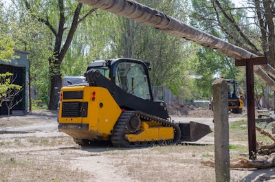 Compact track loader at a jobsite.