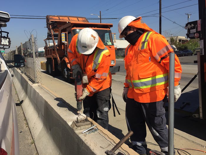 Caltrans workers concrete road project