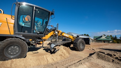 Case 836C motor grader on slope