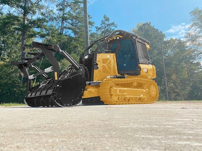 Cat D1 Mulcher Small Dozer in wooded area.