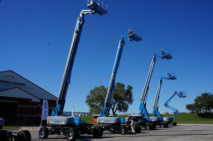 Genie aerial work platforms parked in a row.