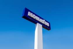 Komatsu sign with new branding.