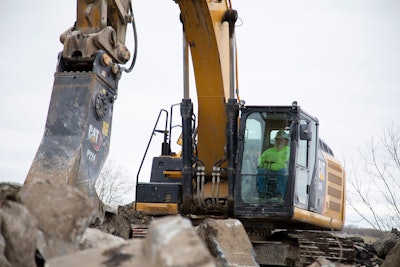 Cat Pulverizer breaking concrete