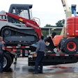 Takeuchi CTL and Skyjack lift on a trailer at H&E Equipment Services in Fairburn, GA.