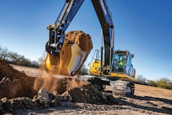 John Deere 350G LC Excavator scooping dirt