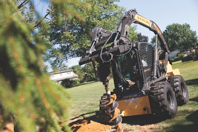 New Holland L328 skid steer drilling