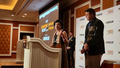 Marcia Veidmark, President of SSC Underground, accepts her Contractor of the Year award