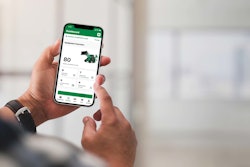 Person holding phone and looking at the Sunbelt Rentals Mobile App