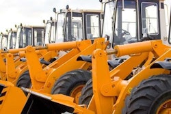 Wheel loaders parked in a row