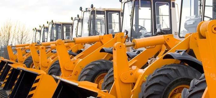 Wheel loaders parked in a row