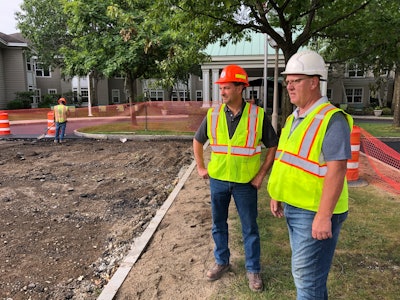chip kronau and ron brock wearing safety gear