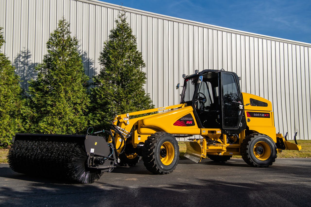 Mauldin M415XT Maintainer sweeper attachment