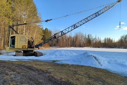 1961 American 399-BC crawler crane extended in snow