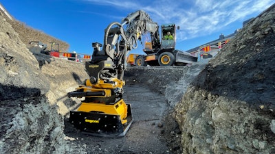 Engcon compactor plate being utilized on a job site